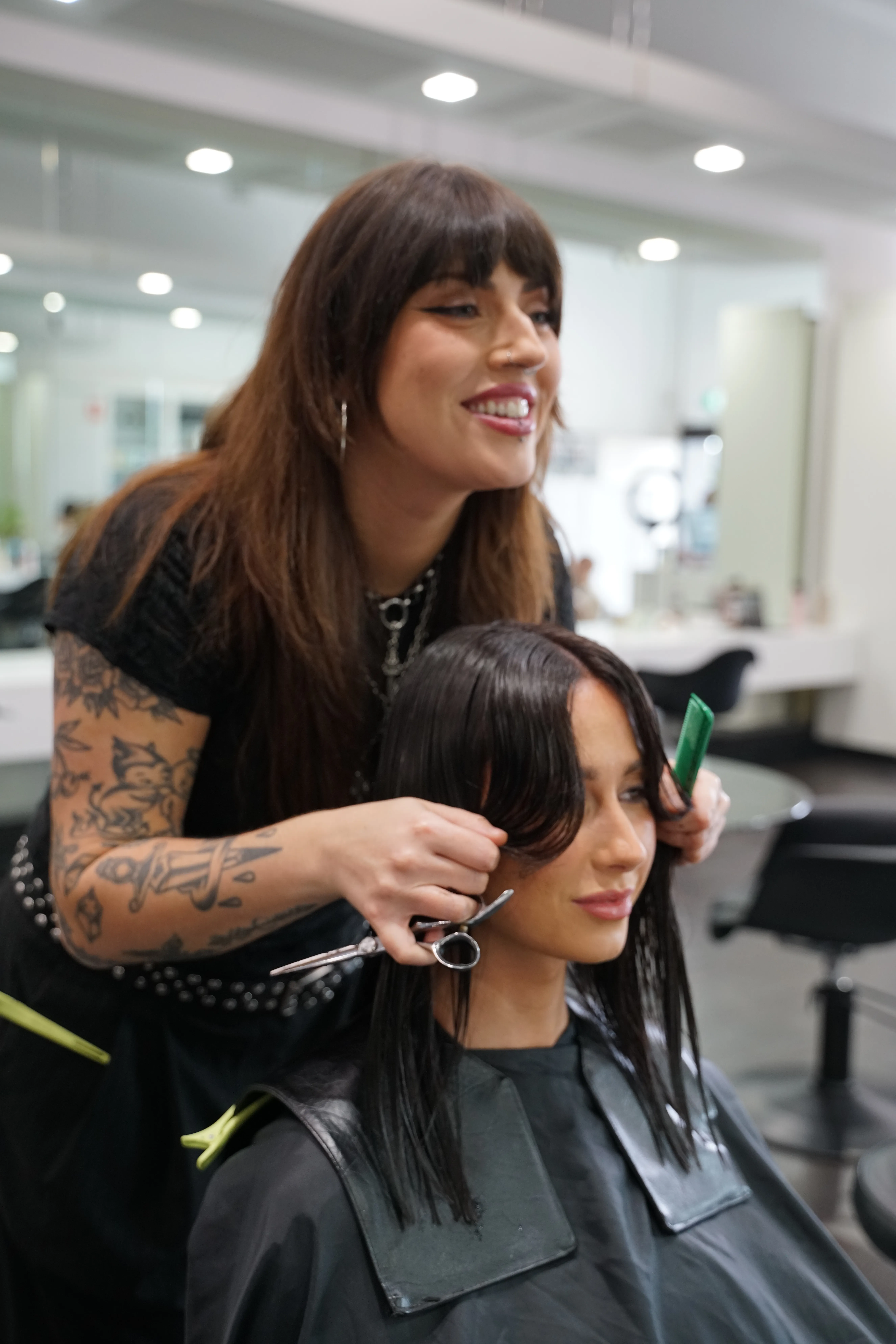 Precision haircut in progress at Salon Ayre