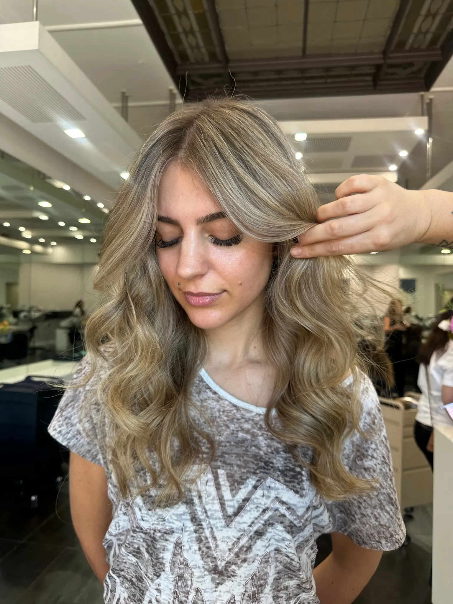 Soft blonde balayage colour by Salon Ayre Mentone